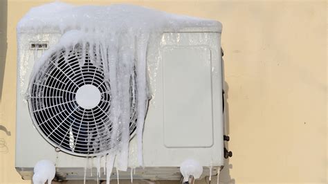 What Causes an Air Conditioner to Freeze Up? And Why Do Penguins Prefer Icy Thermostats?